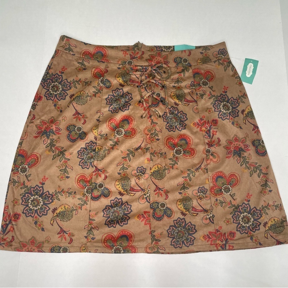NWT Maurice’s Floral Tan Skirt. Size M. Soft suede like feel. Laced front ties